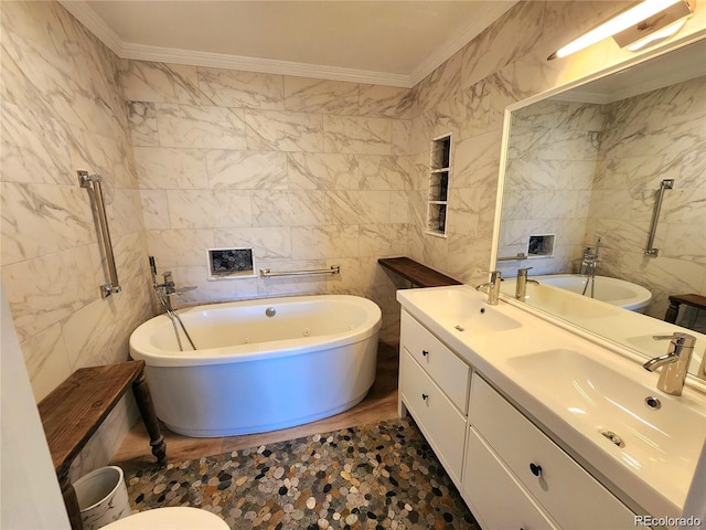 154 Fawn Ct, Silverthorne, CO 80443 - bathroom with tile walls, a jetted tub, crown molding, double vanity, and toilet