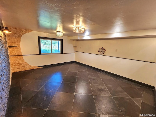 154 Fawn Ct, Silverthorne, CO 80443 - unfurnished room with dark tile patterned flooring