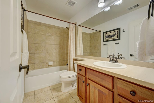 full bathroom with tile patterned flooring, vanity, toilet, and shower / bathtub combination with curtain