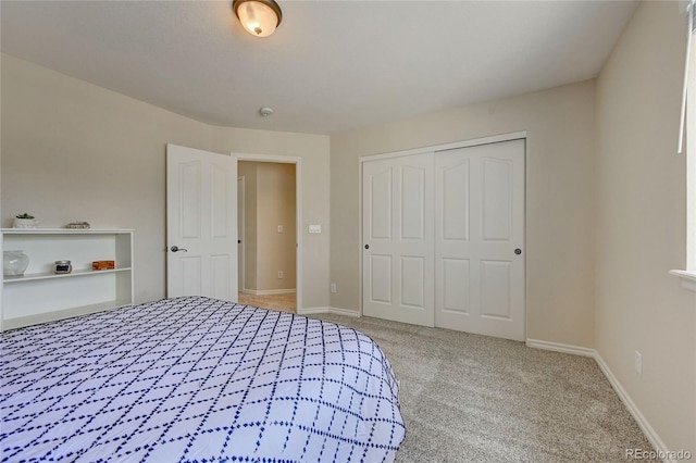 unfurnished bedroom featuring carpet flooring and a closet