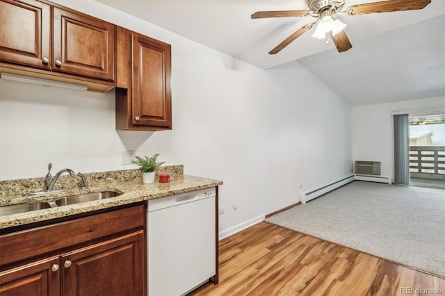 kitchen with white dishwasher, vaulted ceiling, light wood-style floors, a baseboard heating unit, and a sink