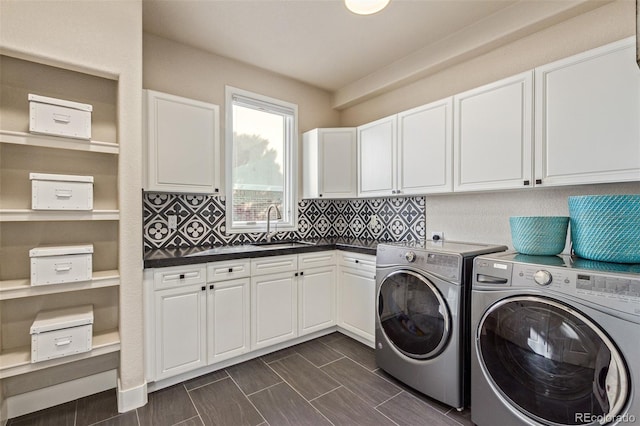 618 Fairchild Dr, Highlands Ranch, CO 80126 - washroom featuring washing machine and dryer, a sink, and cabinet space