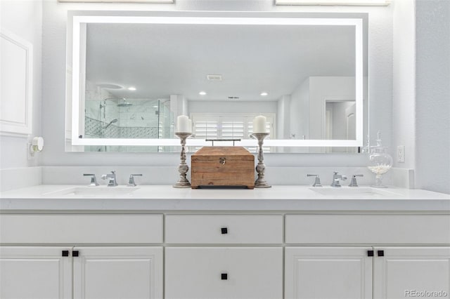 618 Fairchild Dr, Highlands Ranch, CO 80126 - full bathroom featuring a shower with shower door, a sink, and double vanity