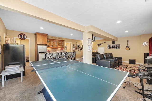 playroom featuring light colored carpet