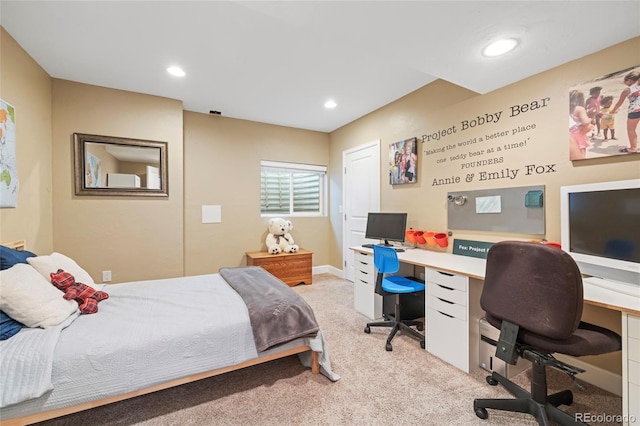 bedroom featuring light carpet