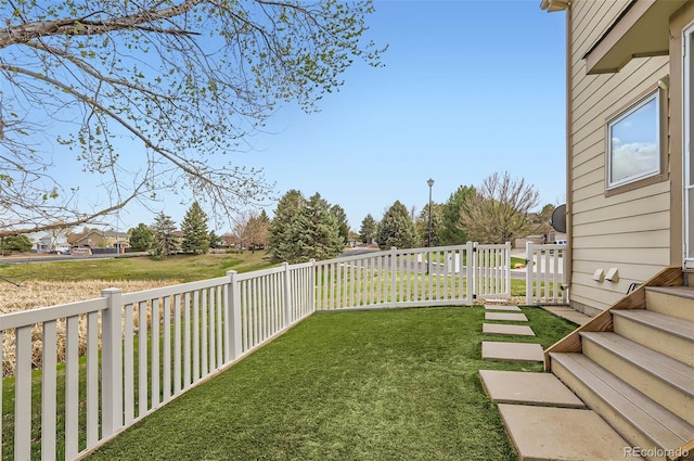 3805 E 106th Ave, Thornton, CO 80233 - view of yard featuring a fenced backyard