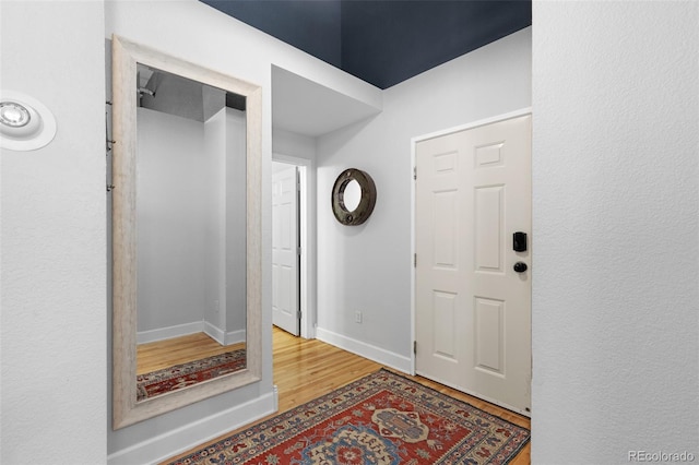 foyer with light wood-type flooring