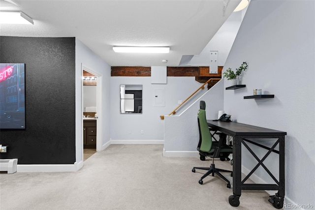 carpeted office space featuring a baseboard radiator