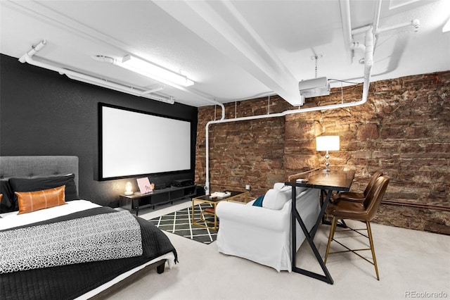 home theater room featuring concrete floors