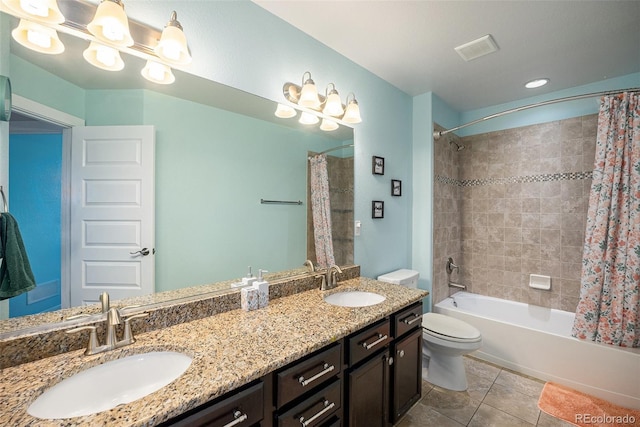 bathroom with tile patterned floors, shower / tub combo, toilet, and double vanity
