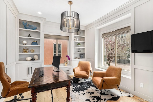 7033 E Lake Cir, Centennial, CO 80111 - office area featuring a chandelier, recessed lighting, light wood-type flooring, and built in features