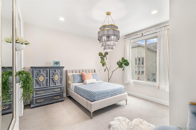 7033 E Lake Cir, Centennial, CO 80111 - carpeted bedroom with a chandelier, baseboards, and recessed lighting