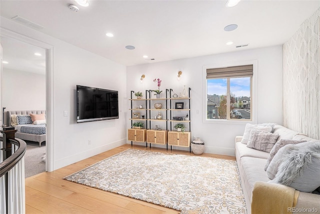 7033 E Lake Cir, Centennial, CO 80111 - living area with recessed lighting, light wood-style floors, and visible vents