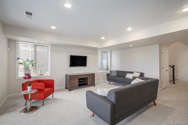 7033 E Lake Cir, Centennial, CO 80111 - living area with baseboards, recessed lighting, visible vents, and light colored carpet