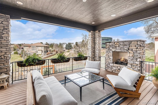 7033 E Lake Cir, Centennial, CO 80111 - wooden deck with an outdoor living space with a fireplace and a residential view
