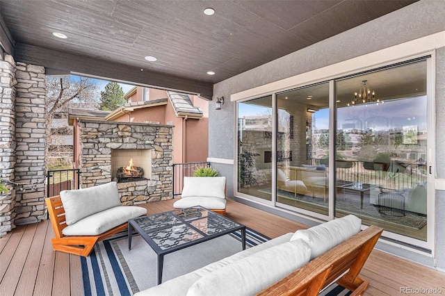 7033 E Lake Cir, Centennial, CO 80111 - wooden deck with an outdoor living space with a fireplace
