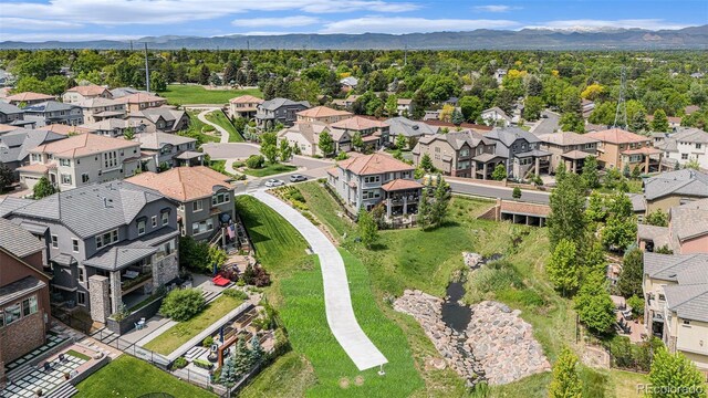 7033 E Lake Cir, Centennial, CO 80111 - aerial view of residential area with a mountainous background