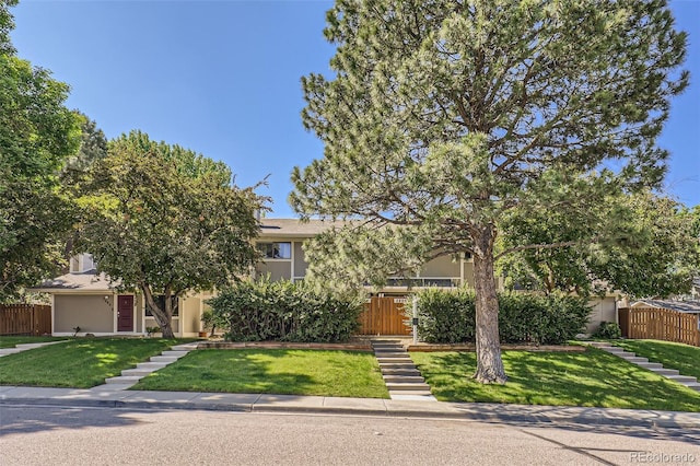 2896 W 119th Ave, Westminster, CO 80234 - view of property hidden behind natural elements featuring stucco siding