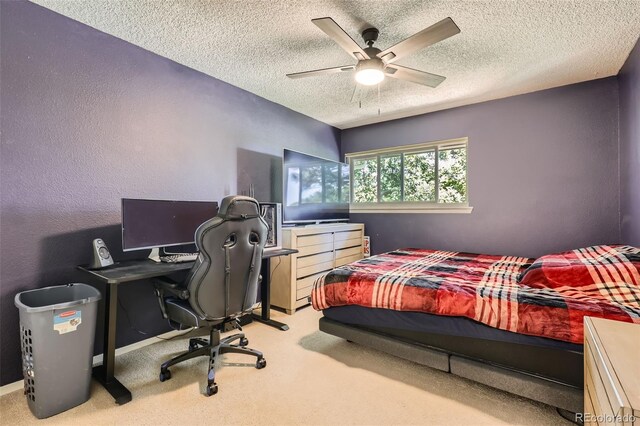2896 W 119th Ave, Westminster, CO 80234 - bedroom with a textured ceiling, carpet flooring, a ceiling fan, a desk, and a textured wall