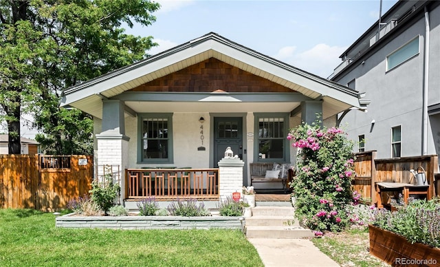4401 Vrain St, Denver, CO 80212 - view of front of home with a porch and stucco siding