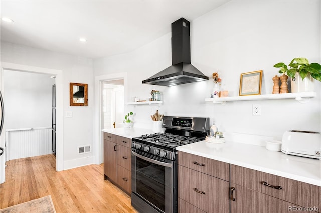 4401 Vrain St, Denver, CO 80212 - kitchen featuring range hood, gas range, open shelves, light countertops, and recessed lighting