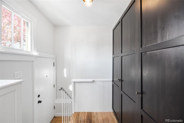 4401 Vrain St, Denver, CO 80212 - hallway with light wood-type flooring and an upstairs landing