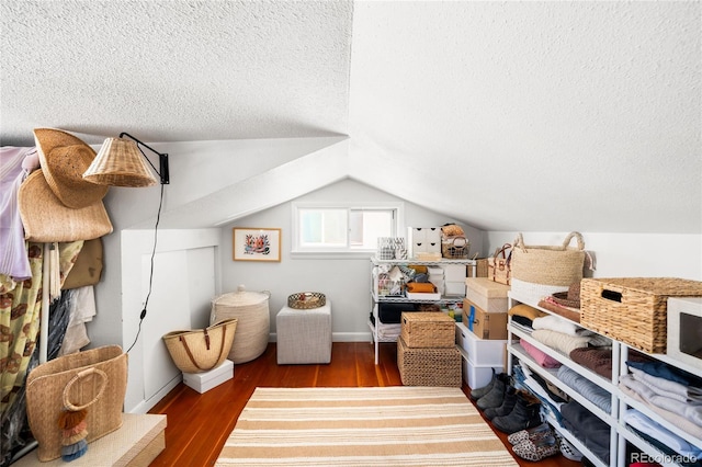 4401 Vrain St, Denver, CO 80212 - bonus room featuring a textured ceiling, lofted ceiling, and wood finished floors