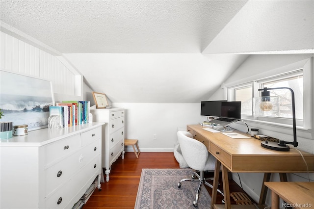 4401 Vrain St, Denver, CO 80212 - home office featuring lofted ceiling, dark wood-style floors, and a textured ceiling