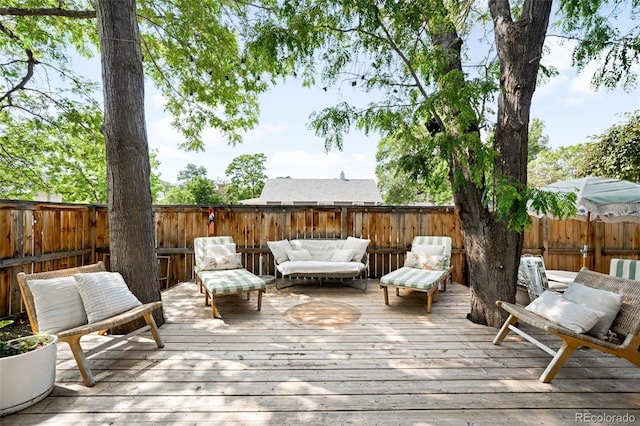 4401 Vrain St, Denver, CO 80212 - deck featuring a fenced backyard and outdoor lounge area
