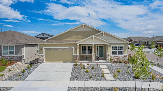 craftsman-style house with a garage and a porch