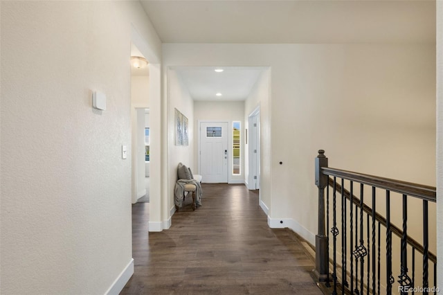 hallway featuring dark hardwood / wood-style floors