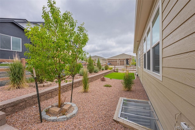 view of yard featuring a garage