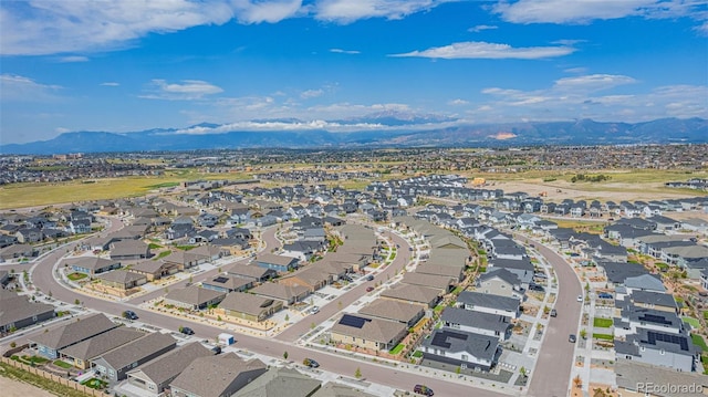 drone / aerial view featuring a mountain view