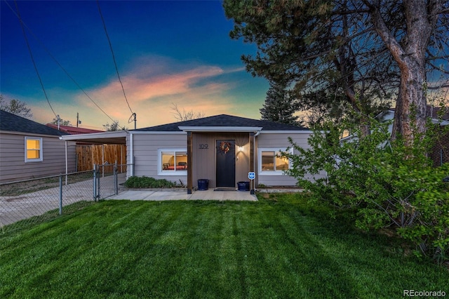 109 S Fulton Ave, Fort Lupton, CO 80621 - view of front of house with concrete driveway and a carport