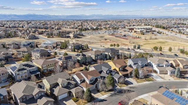 bird's eye view featuring a residential view and a mountain view