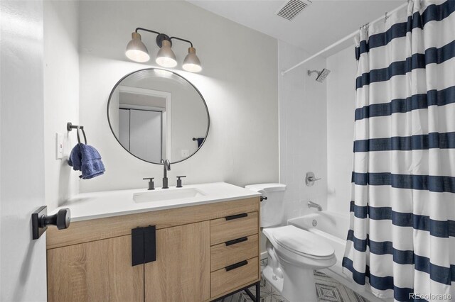 23551 Genesee Village Rd Unit H, Golden, CO 80401 - full bath featuring vanity, toilet, and shower / tub combo