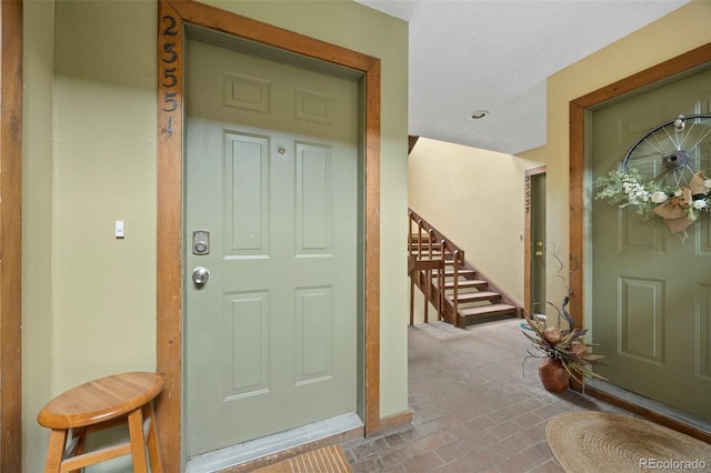 23551 Genesee Village Rd Unit H, Golden, CO 80401 - doorway to property featuring stucco siding