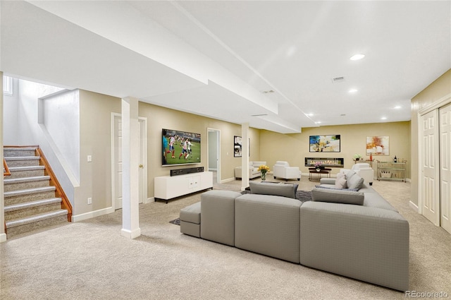 living room with light colored carpet