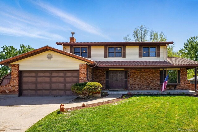 1354 S Macon St, Aurora, CO 80012 - view of front of home with a chimney, a garage, a front yard, concrete driveway, and a tile roof