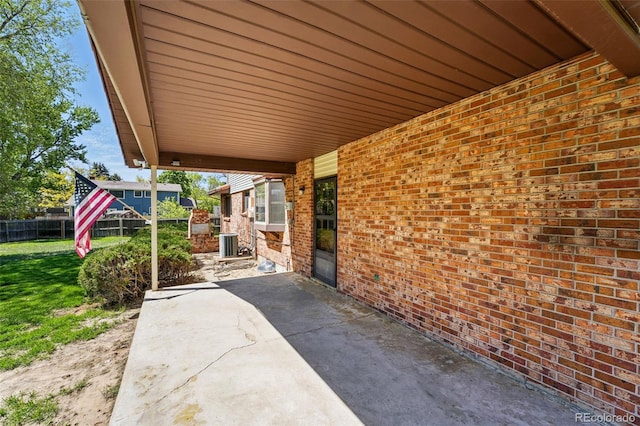 1354 S Macon St, Aurora, CO 80012 - view of patio / terrace with central AC