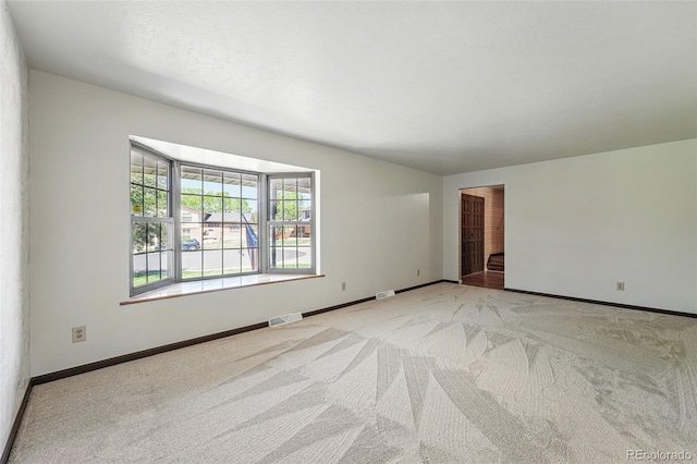 1354 S Macon St, Aurora, CO 80012 - unfurnished room with light colored carpet and baseboards