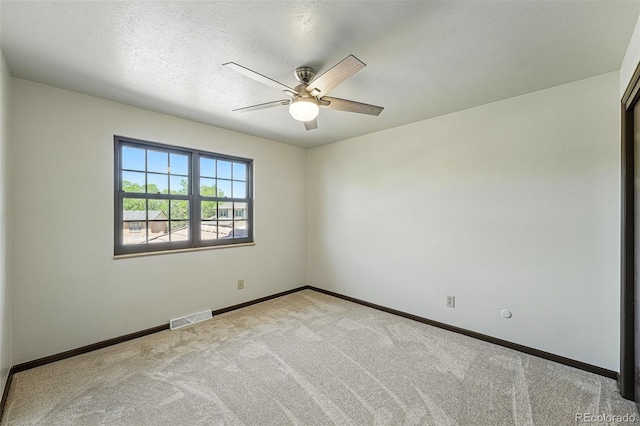 1354 S Macon St, Aurora, CO 80012 - unfurnished room with ceiling fan, carpet, and baseboards