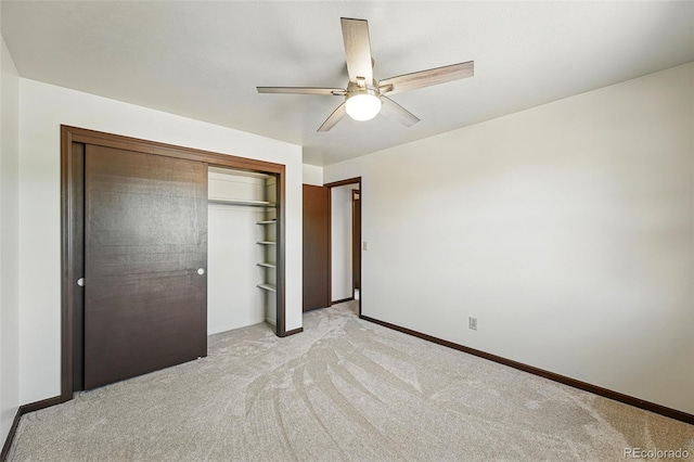 1354 S Macon St, Aurora, CO 80012 - unfurnished bedroom with light carpet, baseboards, a closet, and ceiling fan