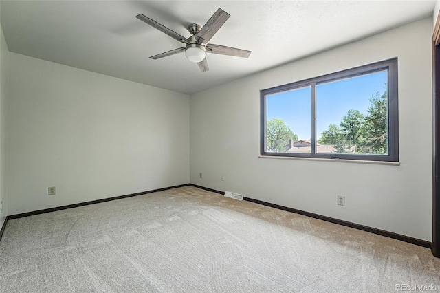 1354 S Macon St, Aurora, CO 80012 - carpeted empty room featuring ceiling fan and baseboards