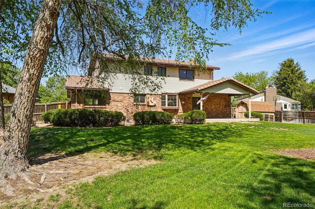 1354 S Macon St, Aurora, CO 80012 - view of front of home with brick siding
