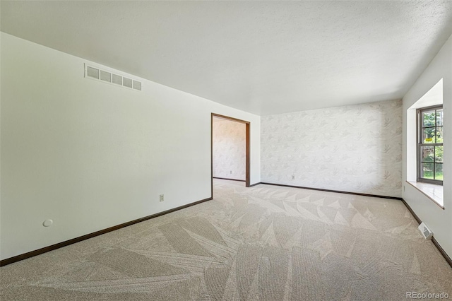 1354 S Macon St, Aurora, CO 80012 - carpeted spare room with baseboards
