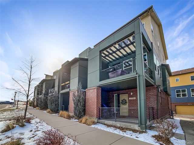 view of snow covered building