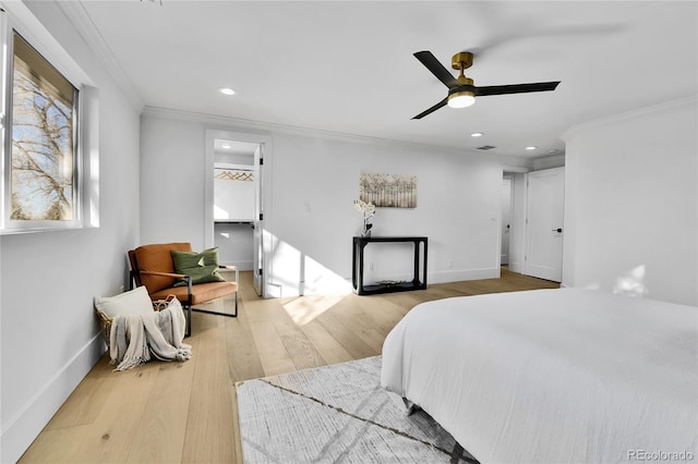 bedroom featuring crown molding, recessed lighting, wood finished floors, ceiling fan, and baseboards