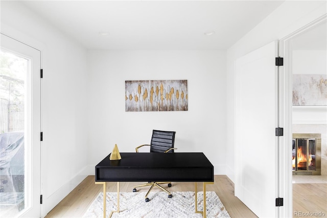 3930 S Hillcrest Dr, Denver, CO 80237 - office space with light wood finished floors and a glass covered fireplace