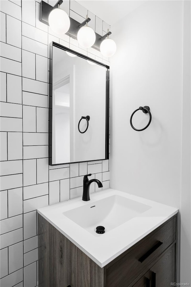3930 S Hillcrest Dr, Denver, CO 80237 - bathroom with vanity and tile walls